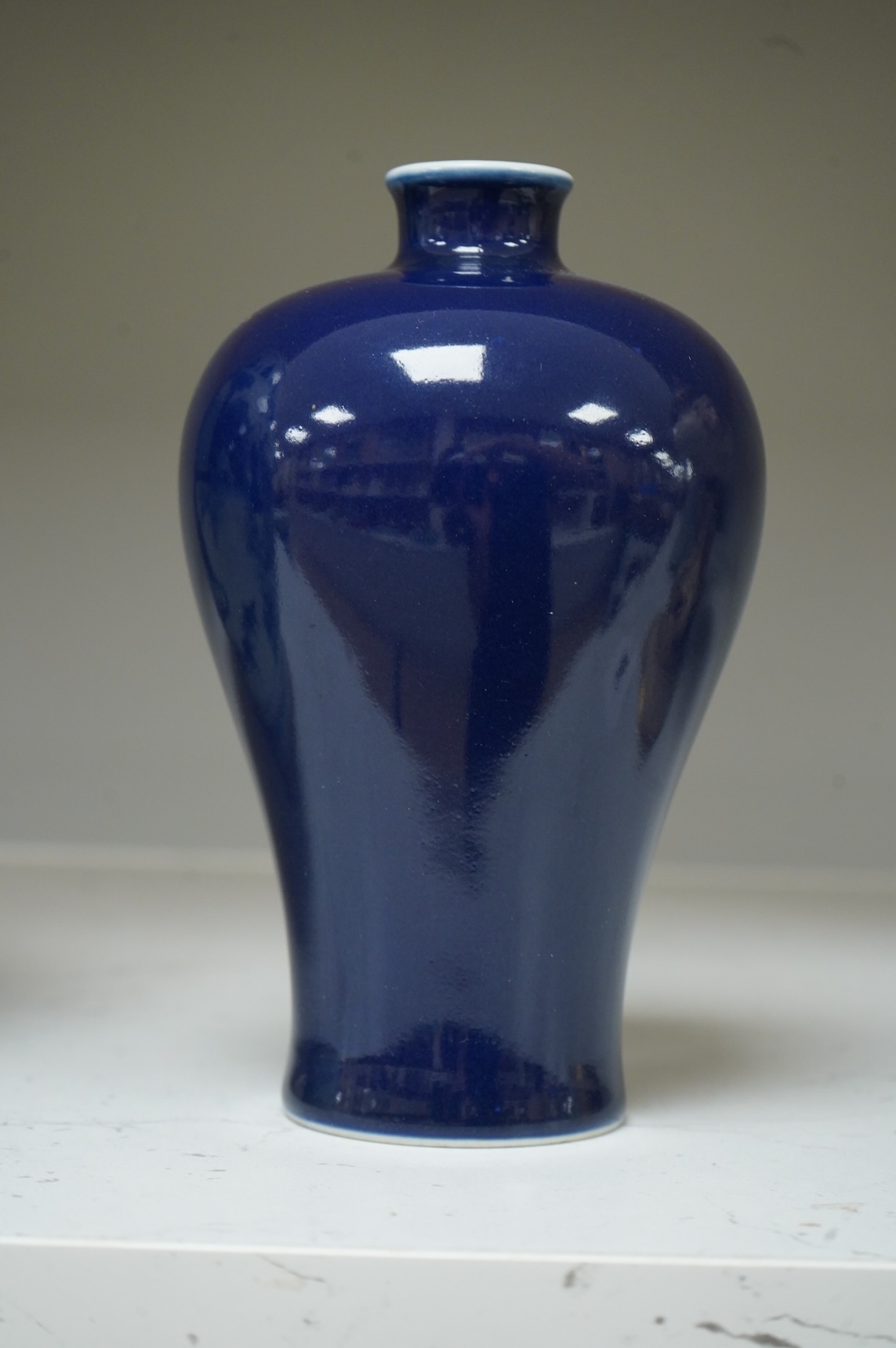 A Chinese blue monochrome meiping, Kangxi mark but later, 17cm